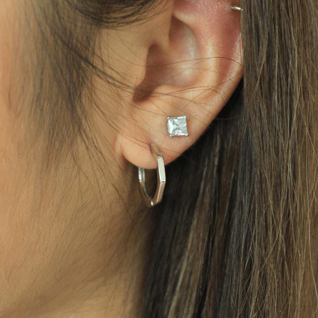 woman wearing sterling silver bamboo hoop earrings 