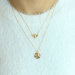 Load image into Gallery viewer, woman wearing sterling silver 18k gold sweetest necklace bee and honeycomb pendants
