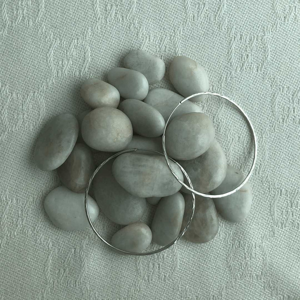 sterling silver with rhodium plating crushed hoop earrings
