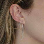 Load image into Gallery viewer, woman wearing sterling silver rhodium plated sleek thread earrings
