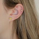Load image into Gallery viewer, woman wearing sterling silver 18k gold plated heartstring earrings
