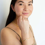 Load image into Gallery viewer, woman wearing sterling silver 18k gold plated mini link earrings
