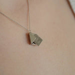 Load image into Gallery viewer, woman wearing sterling silver sent with love necklace
