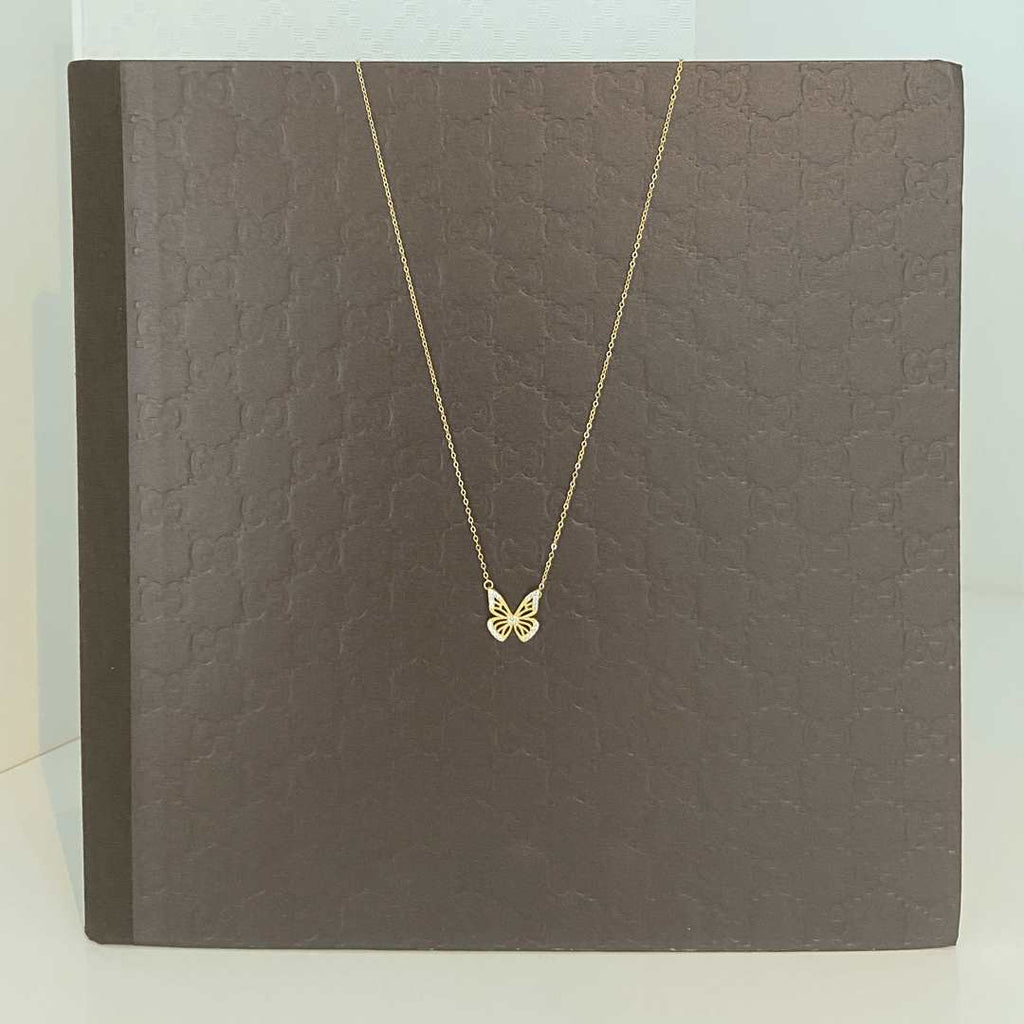 sterling silver with 18k gold plating flying solo butterfly necklace