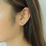Load image into Gallery viewer, woman wearing sterling silver 18k gold plated cross earrings
