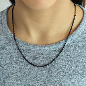 woman wearing stainless steel black gun metal plated round link necklace