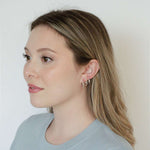 Load image into Gallery viewer, woman wearing sterling silver rhodium plated simply hoops
