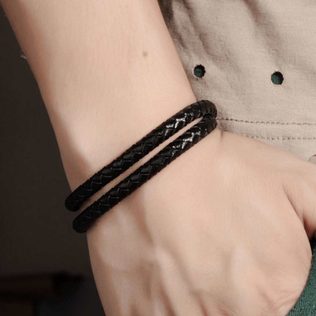 man wearing leather braided bracelet